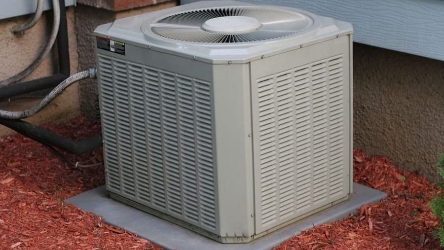 Air conditioner outside a home ready for maintenance